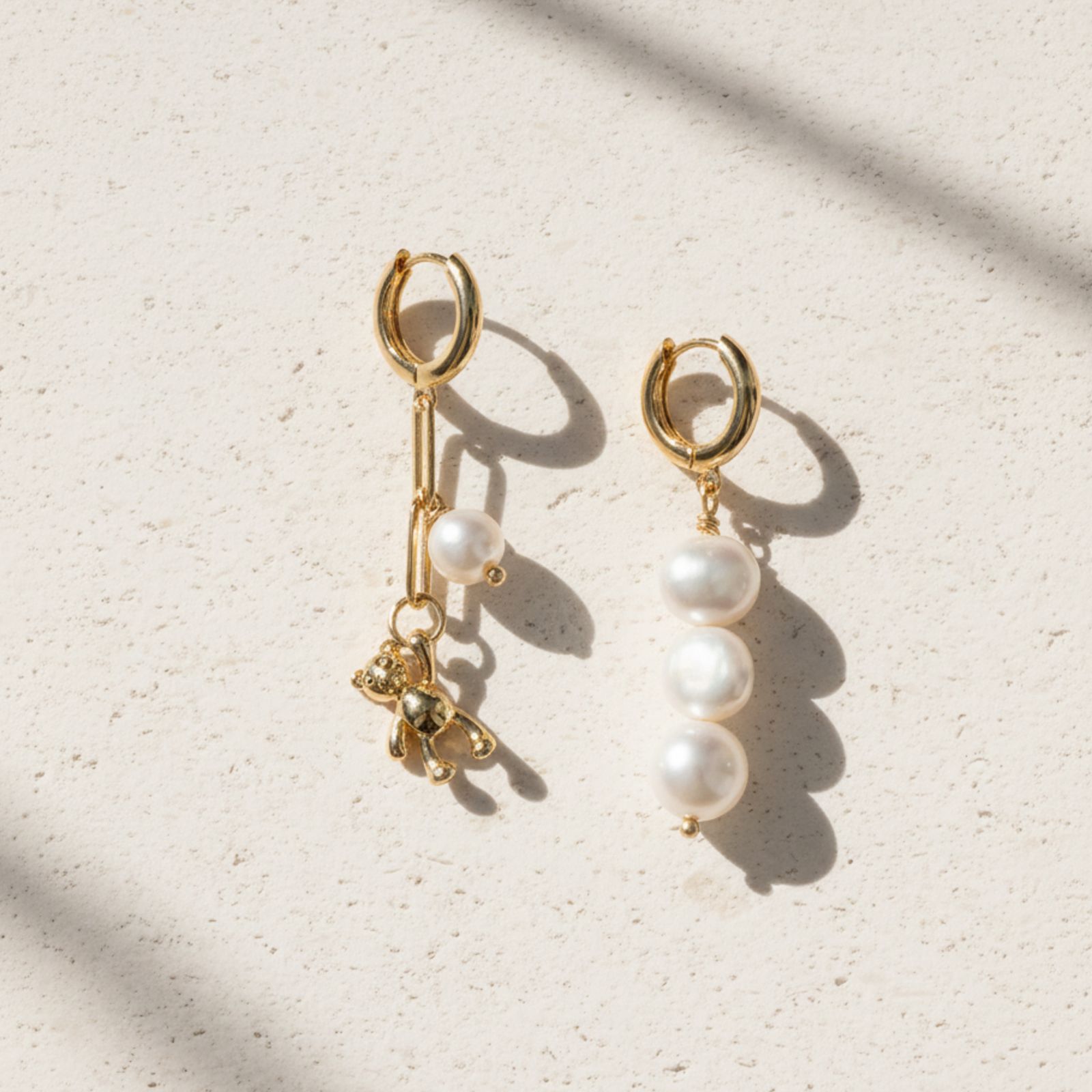 Joey Baby Mismatched Freshwater Pearl Earrings with Gold Teddy Bear Charm
