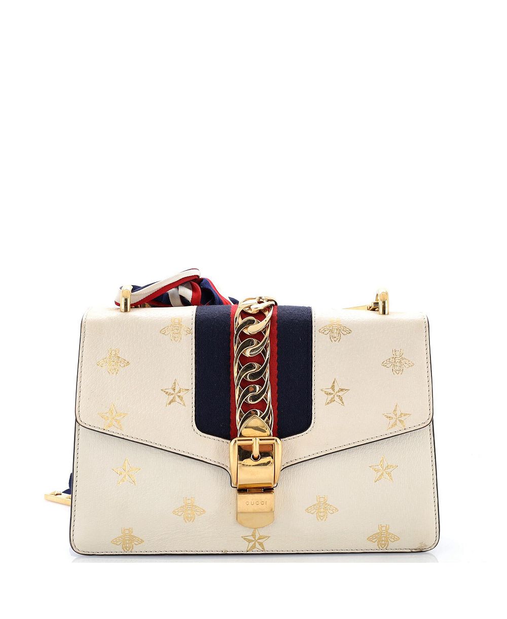 Б/у сумка Gucci Small Sylvie из кожи с принтом