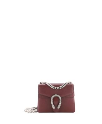 Б/у маленькая кожаная сумка Gucci Mini Dionysus