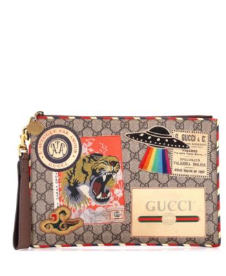 Б/у косметичка Gucci Courrier из лакированной ткани GG с молнией